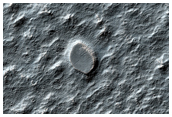 Craters on an Ice-Rich Débris Apron
