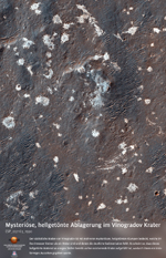 Mysteriöse, hellgetönte Ablagerung im Vinogradov Krater