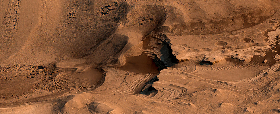 Light-Toned Layering in a Labyrinthus Noctis Pit, rendered using Autodesk Maya and Adobe Lightroom. HiRISE data processed using gdal.