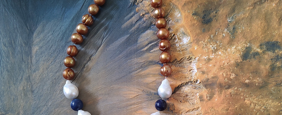 A necklace with hues inspired by HiRISE image ESP_040663_1415