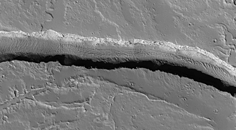 Cones and Channels East of Olympus Mons