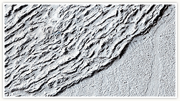 Lava against an Impact Crater in Elysium Planitia