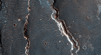 Possible Fluvial Features in Golden Crater