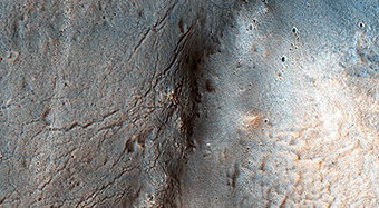 Smooth and Fractured Deposits in Eridania Valleys