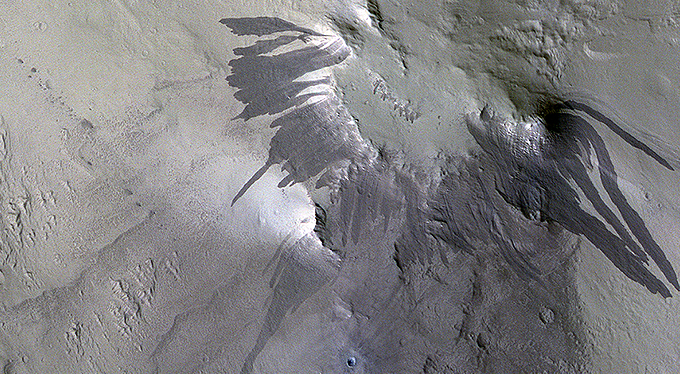 Blast Waves and Dusty Landslides