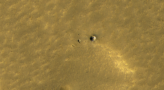 Long-lasting Ice in a Young Crater