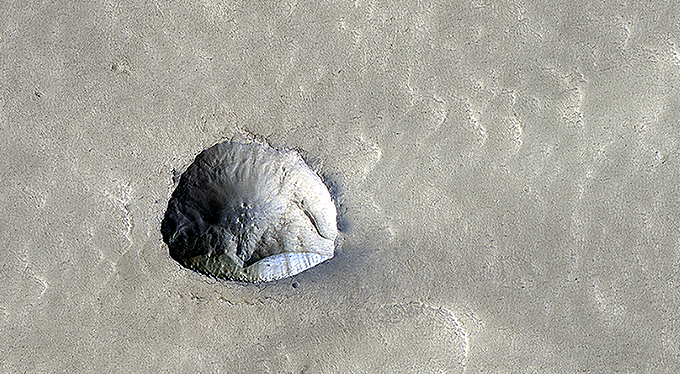 Icy Cliffs and Impact Craters